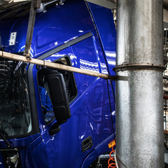 Workers in machinery factory in China.