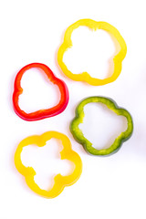 Slices of bell pepper isolated on white background.