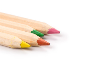 Wooden colorful ordinary pencils isolated on a white background