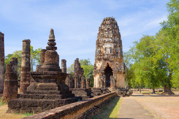 Sunny day on the ruins of the ancient Buddhist temple Wat Phra Pai Luang. Sukhothai, Thailand