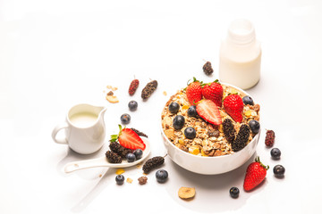 Healthy Breakfast corn flake with berries and milk isolated