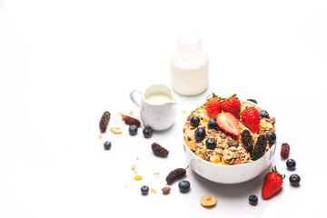 Healthy Breakfast corn flake with berries and milk isolated
