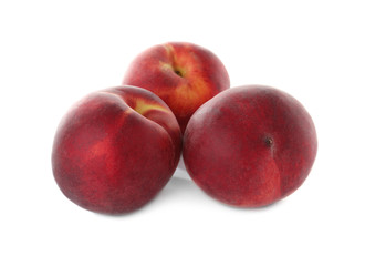 Fototapeta na wymiar Delicious ripe sweet peaches isolated on white