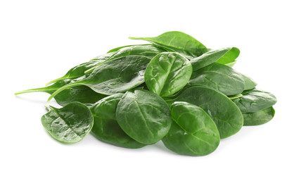 Pile of fresh green healthy baby spinach leaves on white background