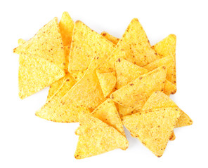 Pile of tasty Mexican nachos chips on white background, top view