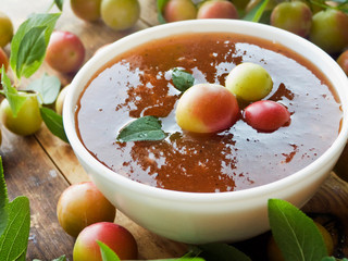 Tkemali sauce on wood