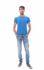 in full growth. confident young man in jeans.