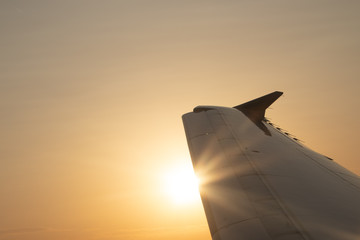 Wing of a plane with low sun