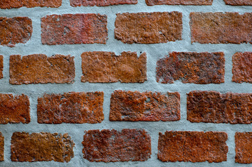 Orange brick used in construction architecture, background texture