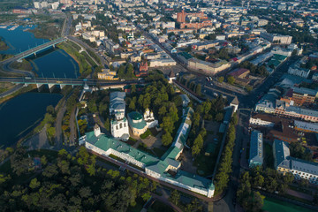 Fototapeta na wymiar The Transfiguration Monastery in the cityscape on a sunny July morning (aerial photography). Yaroslavl, Golden Ring of Russia