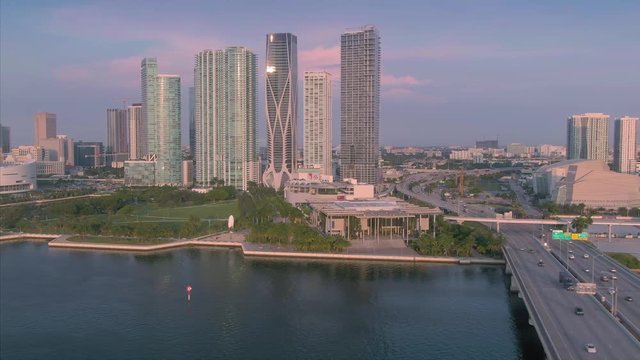 Description: Aerial over traffic on the Macarthur Causeway in downtown Miami at sunrise. 25 July 2019