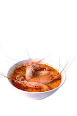 boiled shrimp with herb in Thai spicy soup or tom yum kung on bowl