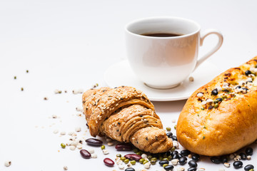 Coffee with whole wheat bread isolated
