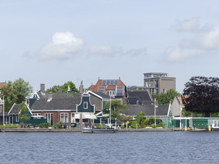 Obraz premium Windmills by the water. Authentic town. The old town in Holland.