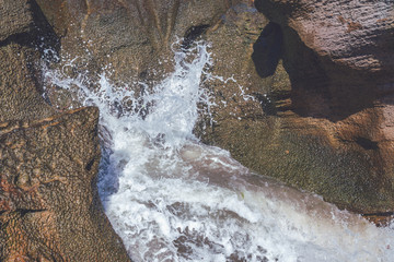 Sea wave in the coastal cave