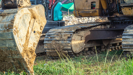 Huge excavator park on construction work site