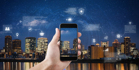 Online data security connection by mobile smart phone and smart technology. Hand holding mobile...