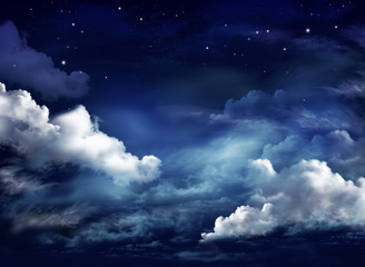 Night sky with clouds. Universe filled with stars