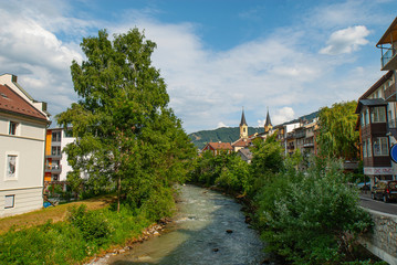 Fototapeta na wymiar Rienz river in old town of Bruneck, South Tyrol, Brunico, Alto Adige, Italia, Italy, Europe