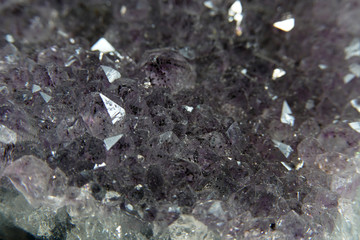 Quartz also called deep quartz photographed in studio in front of black background in Marco mode 