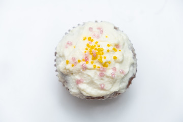 Cake. Cup cake on white table, on white background.