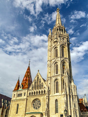 Fototapeta na wymiar Architecture of gothic cathedral of Budapest in a cloudy day.