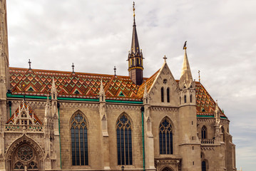 Architecture of gothic cathedral of Budapest in a cloudy day.