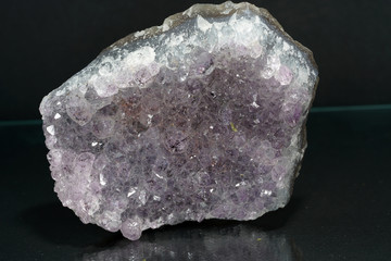 Quartz also called deep quartz photographed in studio in front of black background in Marco mode 