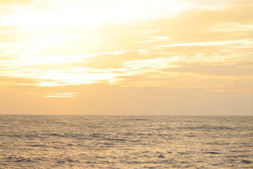 Sun set on a sea with orange sky
