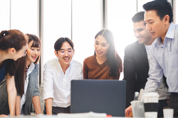 Group of Asian business people and creative designer meeting in office