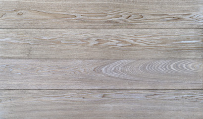Fototapeta premium Whitened wooden boards. Ash tree texture. Table top or floor surface, top view. Template for flat lay design. Copy space. 