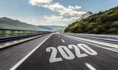 2020 New Year inscription on the asphalt highway. Two thousand and twenty.
