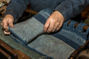 close up of an old traditional Scottish weaving loom for weaving Harris Tweed