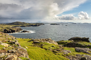 Obraz premium lush west coast of isle of Lewis, outer Hebrides in Scotland with dramatic cloudy sky