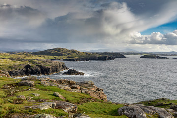lush west coast of isle of Lewis, outer Hebrides in Scotland with dramatic cloudy sky