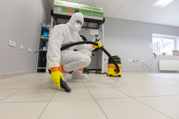 Decontamination of a room after an incident. Practical exercises during a training session on asbestos risk prevention, sample preparation room of an asbestos laboratory