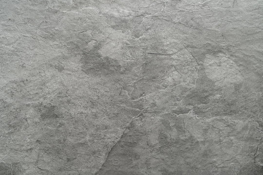 Light grey black slate stone background or texture