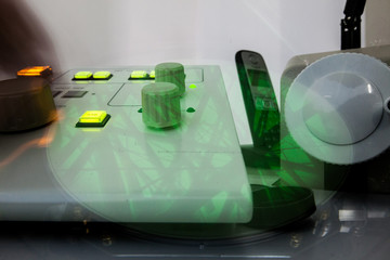 Control panel of an Analytical Transmission Electron Microscope (ATEM) and superimposition of...