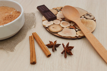 Milk buckwheat soup sprinkled with cinnamon and star anise on the table.