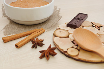 Milk buckwheat soup sprinkled with cinnamon and star anise on the table.