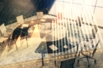 Double exposure of forex chart on conference room background. Concept of stock market analysis