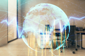 Stock and bond market graph and world map with trading desk bank office interior on background. Multi exposure. Concept of international finance