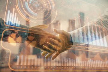 Double exposure of business theme drawing on cityscape background with handshake. Concept of...