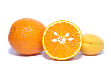Oranges on a white background. Fruit peaches. cinnamon.