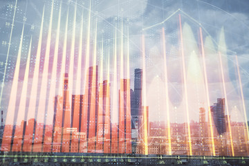 Fototapeta na wymiar Double exposure of financial graph on downtown veiw background. Concept of stock market research and analysis