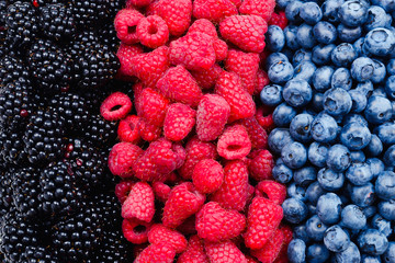 Blackberry, raspberry, blueberry background.  Top view.