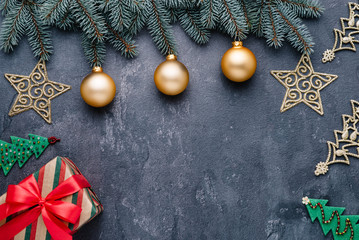 Beautiful celebratory Christmas background. New Year's holidays. Christmas holidays. Beautiful Christmas decorations on the wooden background. Loft style. Mockup