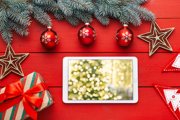 Beautiful celebratory Christmas background. New Year's holidays. Christmas holidays. Beautiful Christmas decorations on the wooden background. Loft style. Mockup