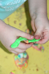 hands of child with pasticine 