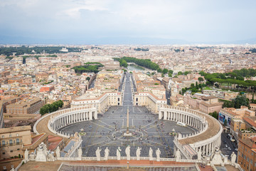 Fototapeta premium View from the dome of the cathedral at Saint Peter's Square in Vatican and aerial panorama of Rome
